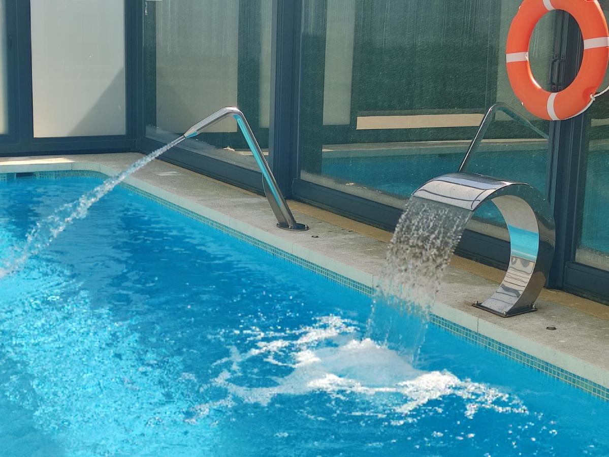 Apartamentos Playa De Covachos 索托德拉马里纳 外观 照片